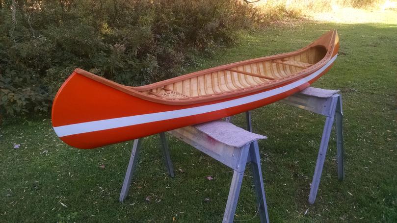 Orange 8 foot canvas display canoe